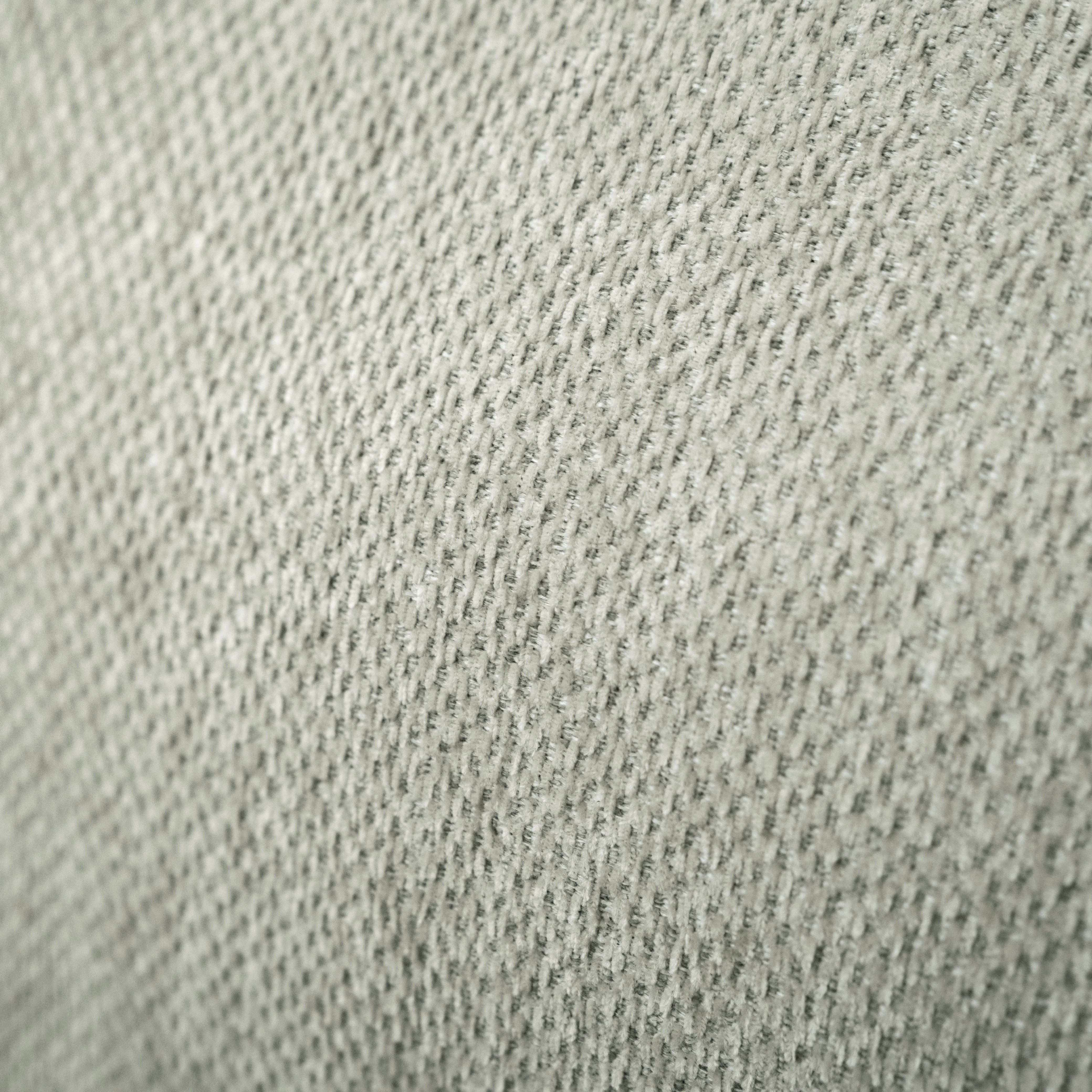 SOFÁ CORACIAA GRIS DER VISTA EN ZOOM DEL RESPALDO 